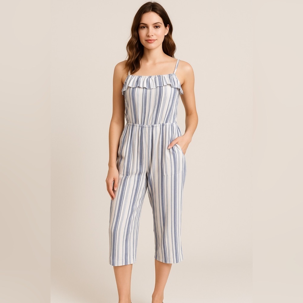 Btween- women’s size 8 white and blue jumpsuit with spaghetti straps and pockets